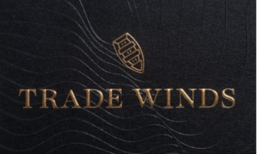 TRADE WINDS WINE RIDING THE CREST OF THE WAVE