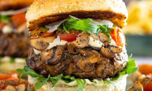 FREE RANGE BEEF & PORTABELLO MUSHROOM BURGER  with oven roasted tomatoes